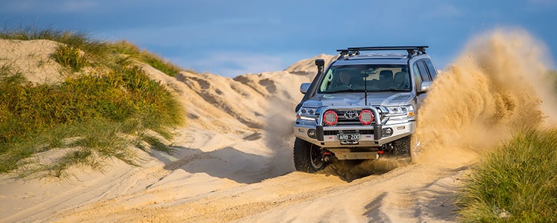 four-wheel-driving on beaches